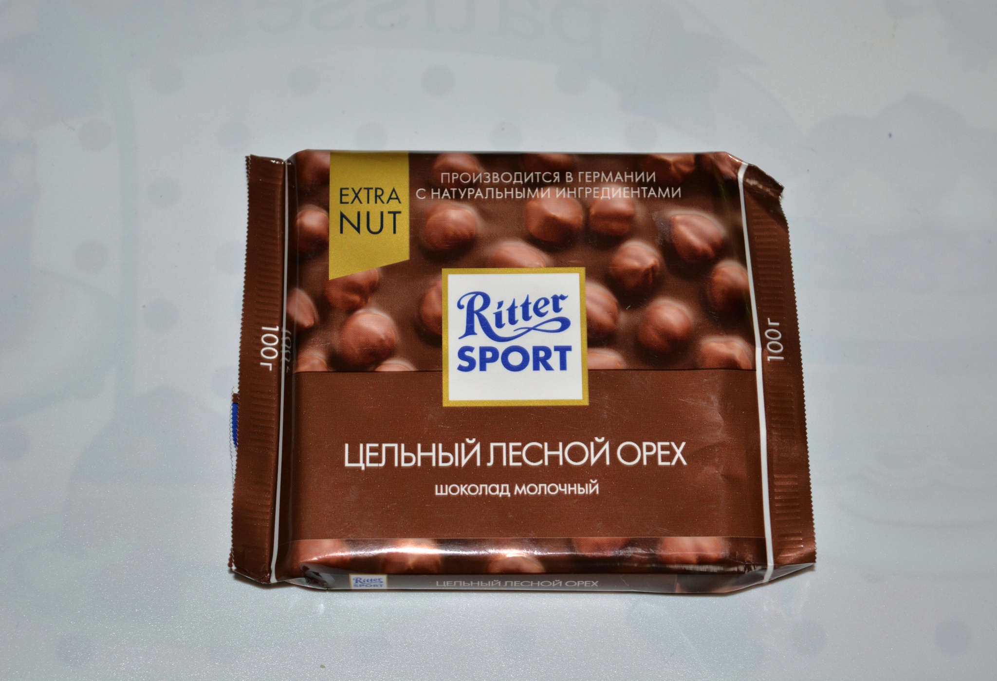 Риттер спорт лесной орех. Ritter Sport Extra nut. Шоколад Ritter Sport молочный Лесной орех 100 гр.. Шоколад Риттер спорт молочный цельный Лесной орех 100 гр. Шоколад Ritter Sport Extra nut молочный цельный Лесной орех.