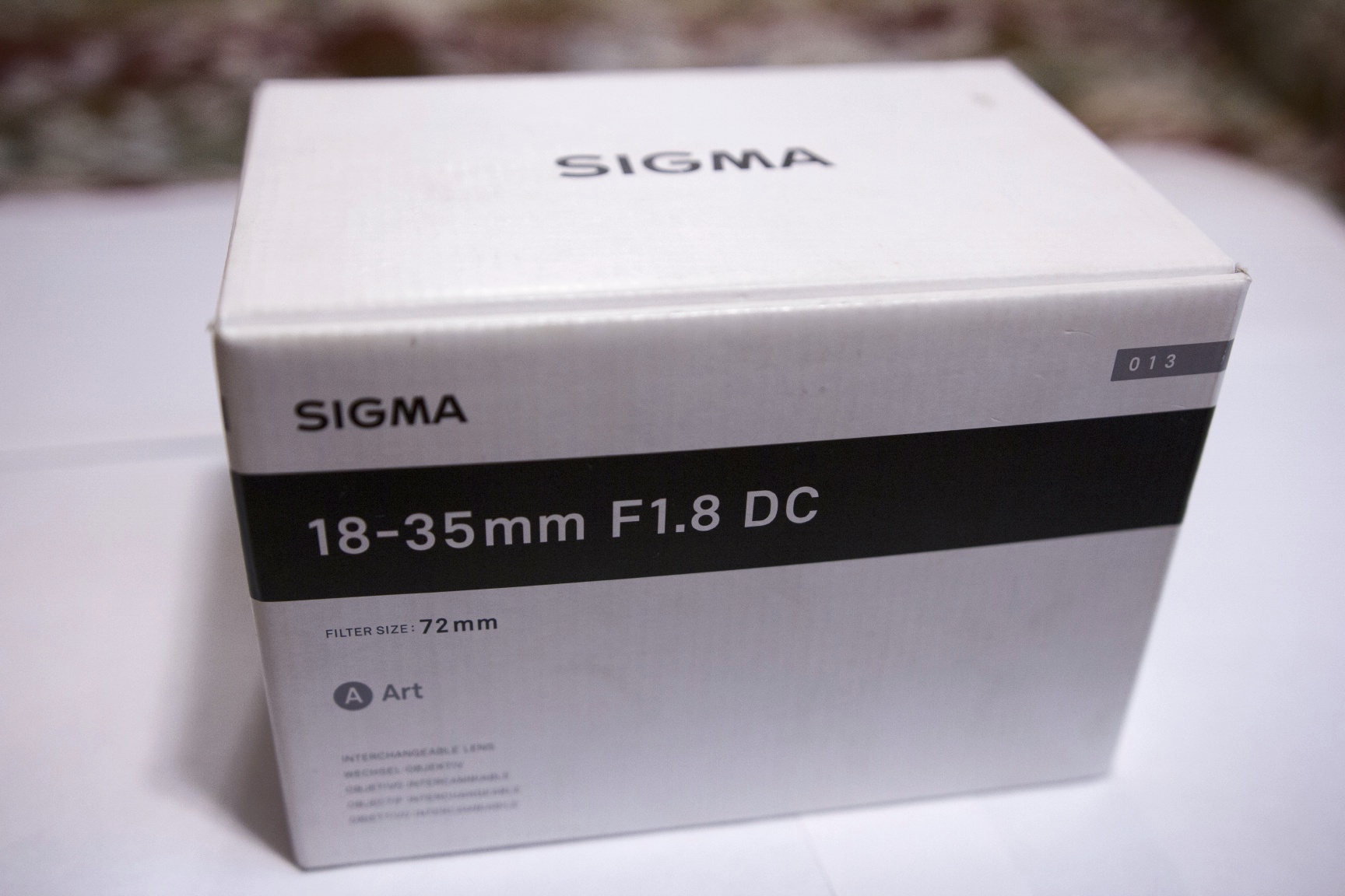 18 35mm f 1.8 dc hsm art. Sigma коробка. Sigma продукция.