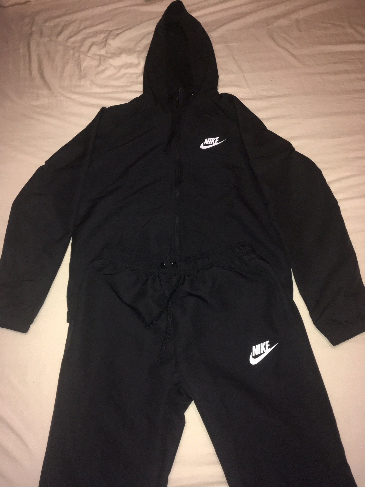 Обзор от покупателя на Спортивный костюм Nike NSW TRK SUIT HD WVN 861772-013 мужской, цвет черный, рус.размер 46-48 — интернет-магазин ОНЛАЙН ТРЕЙД.РУ