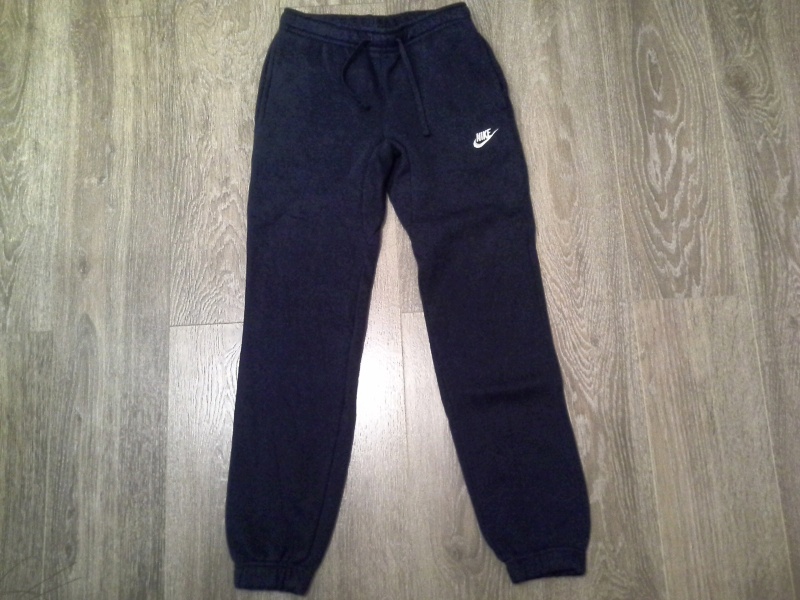 Обзор на Спортивные брюки NIKE 804406-451 Sportswear Pant мужские, цвет темно-синий, размер 42-44 - изображение 1