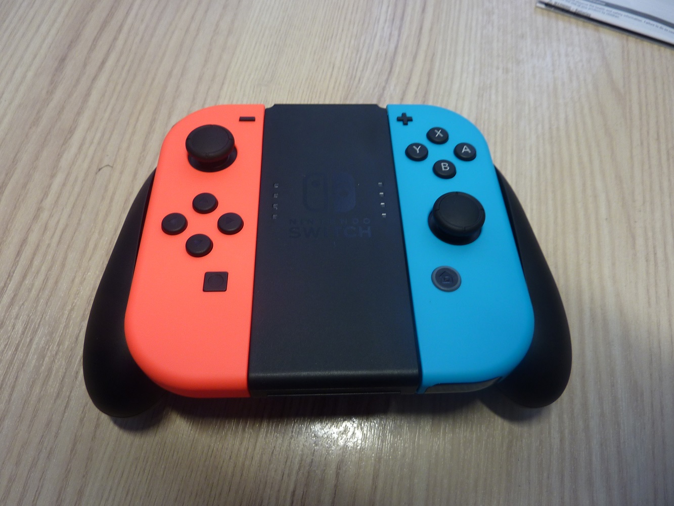 Обзор от покупателя на Игровой контроллер для Nintendo Switch Joy-Con L+R  (неоновый красный / неоновый синий) — интернет-магазин ОНЛАЙН ТРЕЙД.РУ