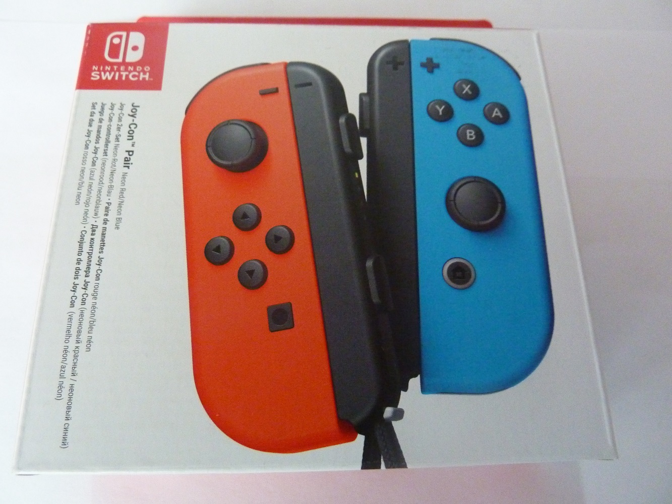 Обзор от покупателя на Игровой контроллер для Nintendo Switch Joy-Con L+R  (неоновый красный / неоновый синий) — интернет-магазин ОНЛАЙН ТРЕЙД.РУ