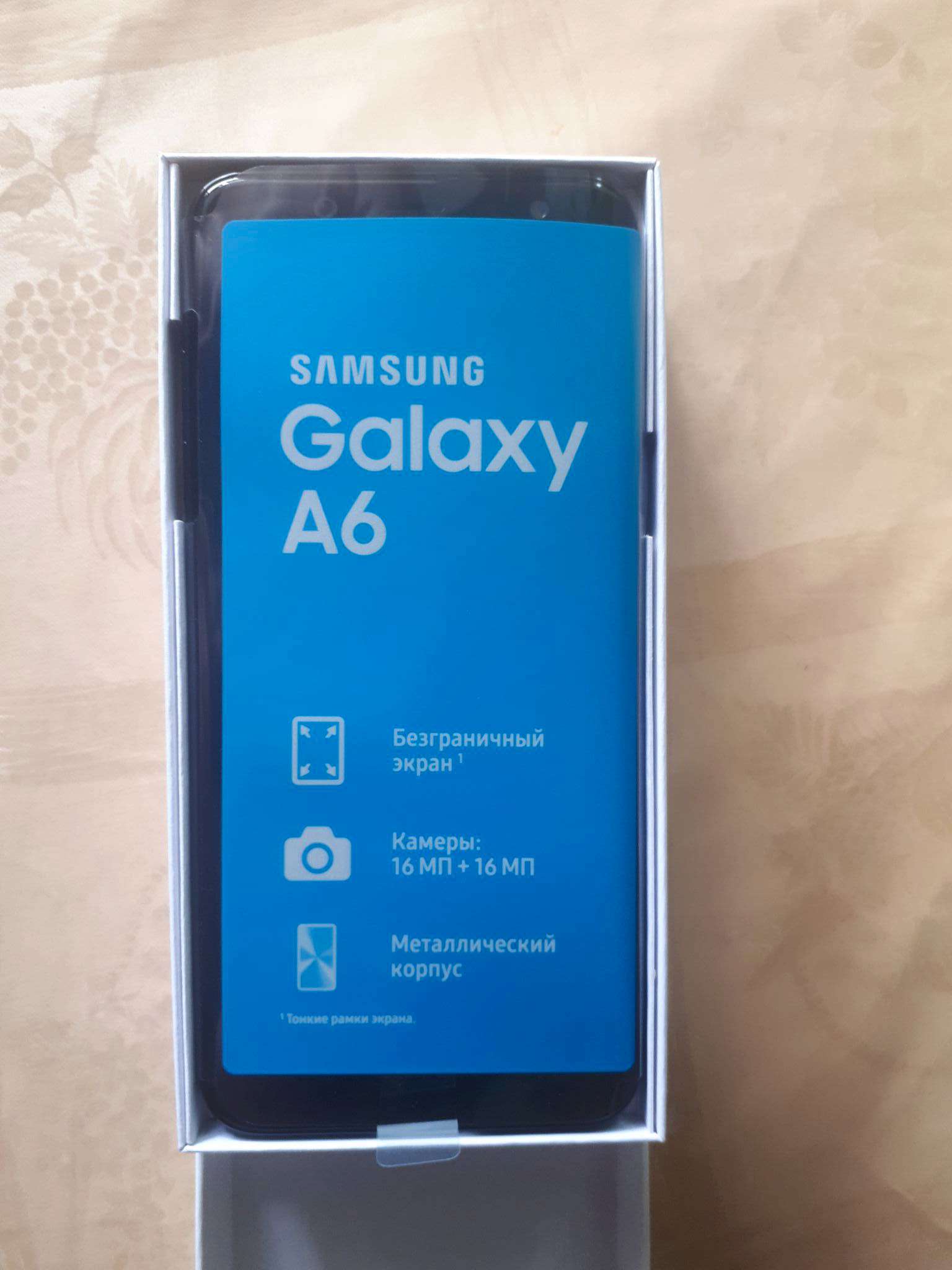 Смартфон Samsung Galaxy A6 SM-A600F (черный) SM-A600FZKNSER — купить в  интернет-магазине ОНЛАЙН ТРЕЙД.РУ