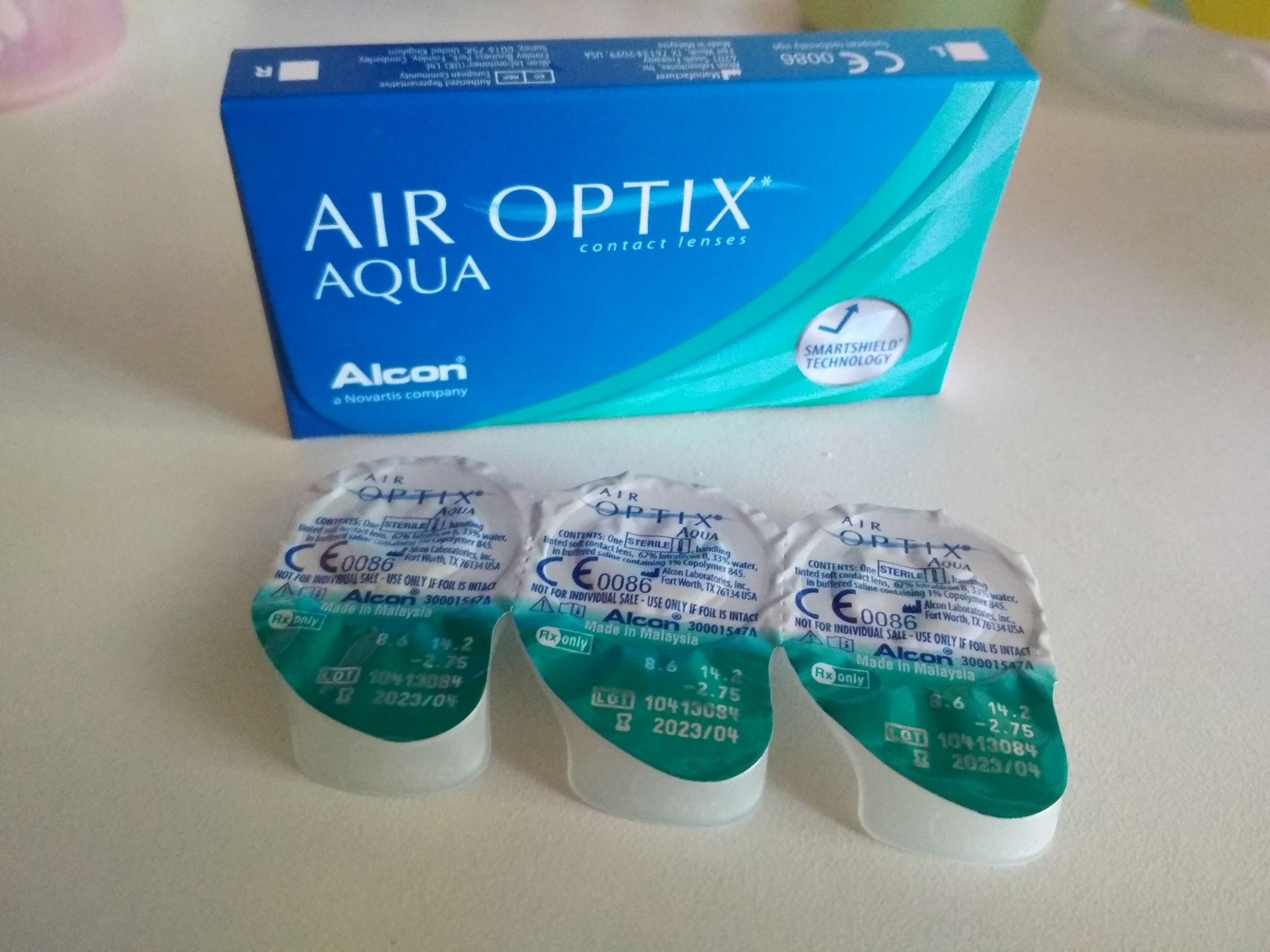 Линзы для глаз магазин. АИР Оптикс Аква линзы 3 линзы. Air Optix Aqua (3 линзы). Air Optix -5.50 линзы. Линзы в блистере Air Optix.