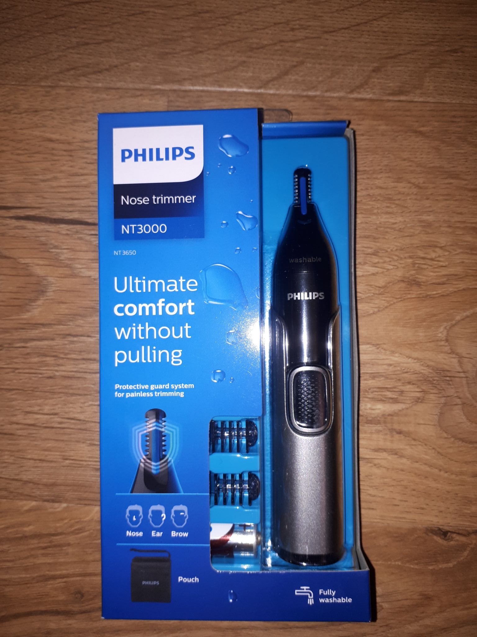 Филипс носа ушей. Триммер Philips nt3650. Триммер для волос nt3650/16 Philips. Триммер Philips Series 3000 nt3650. Триммер Philips nt3000 3650/16 водой.