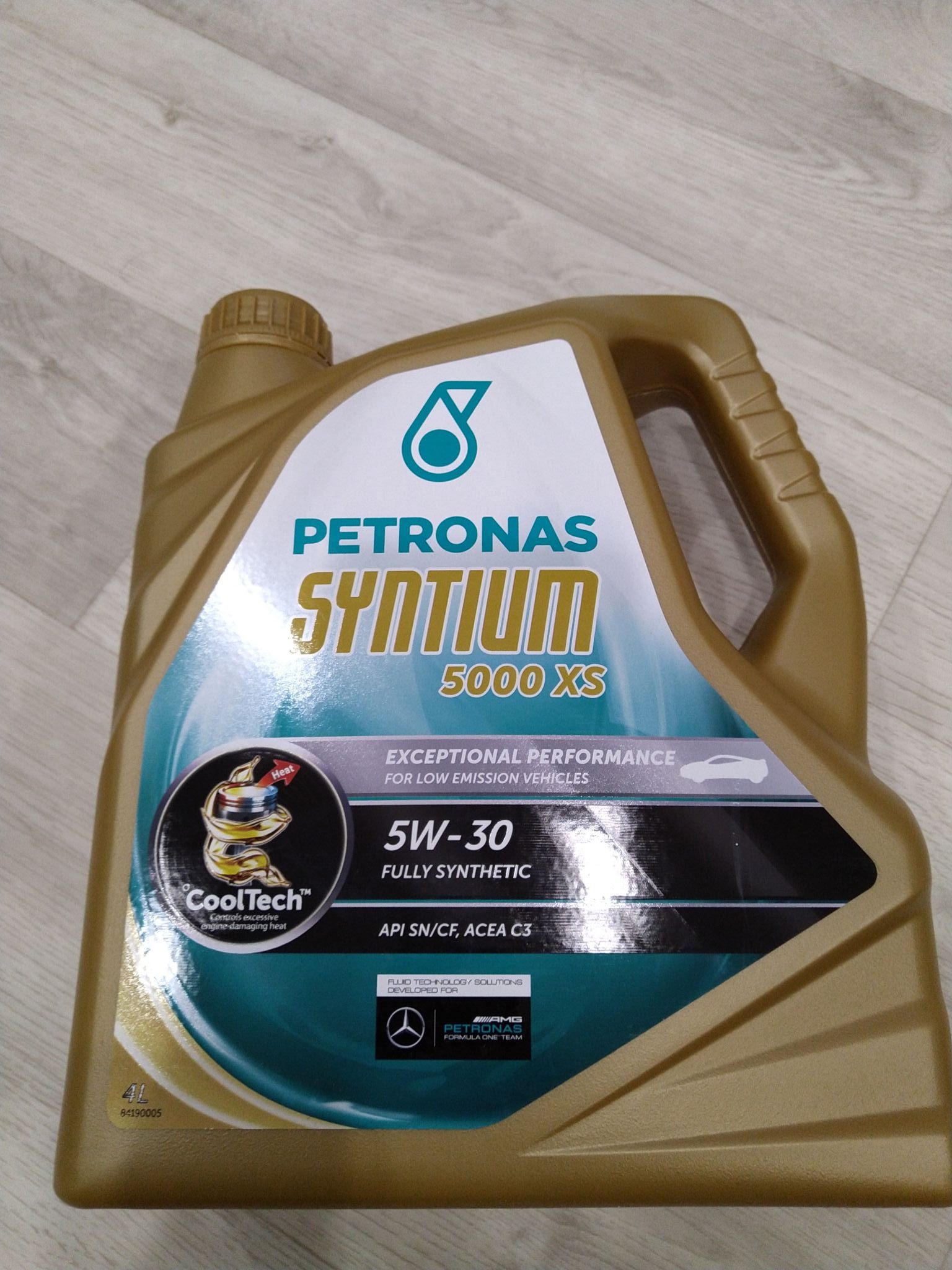 Petronas 5000 av. Petronas 5w30 5000xs. Petronas Syntium 5000 DM 5w-30. Petronas 5w-30 5000 XS 5l. Петронас Синтиум 5000 XS 5w30.