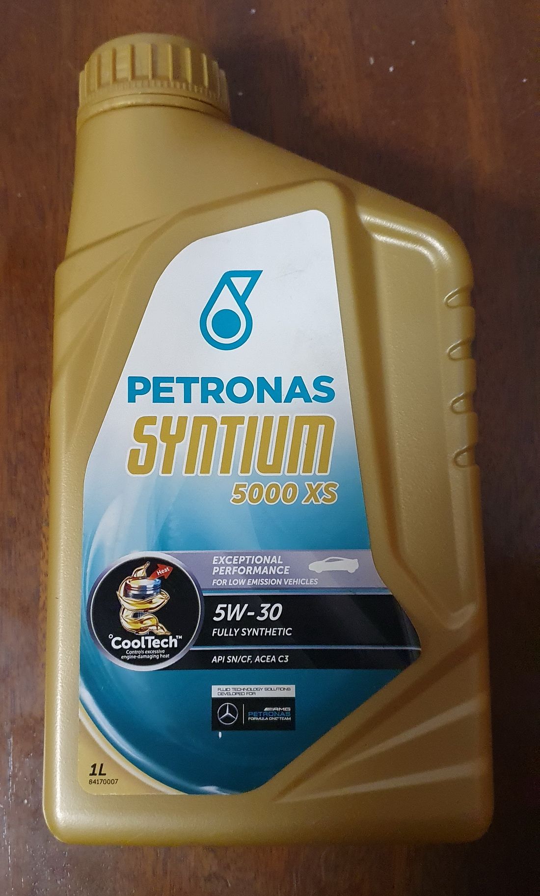 Масло petronas 5w40. Syntium 5000 XS 5w-30. Syntium 5000 XS 5w30 5l. Petronas 5w30 5000xs. Петронас Синтиум 5000 XS 5w30.